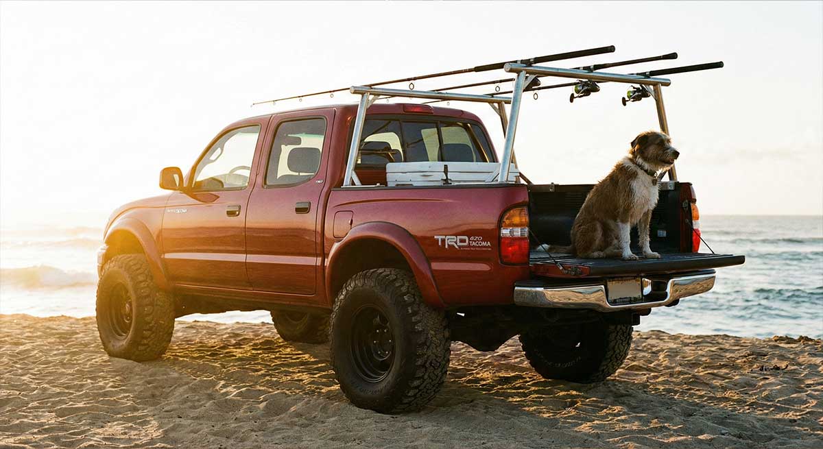 A cherry 2003 Toyota Tacoma. Lifted brah!